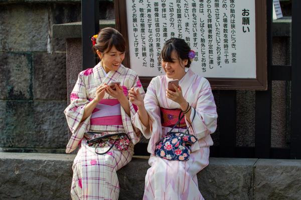 These two Japanese women brought classic attire and current tech together in a fascinating way.